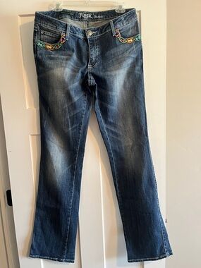 Wrangler Rock 47 Ultra Low Rise Flare Jeans with Multicolor Embroidered Pockets